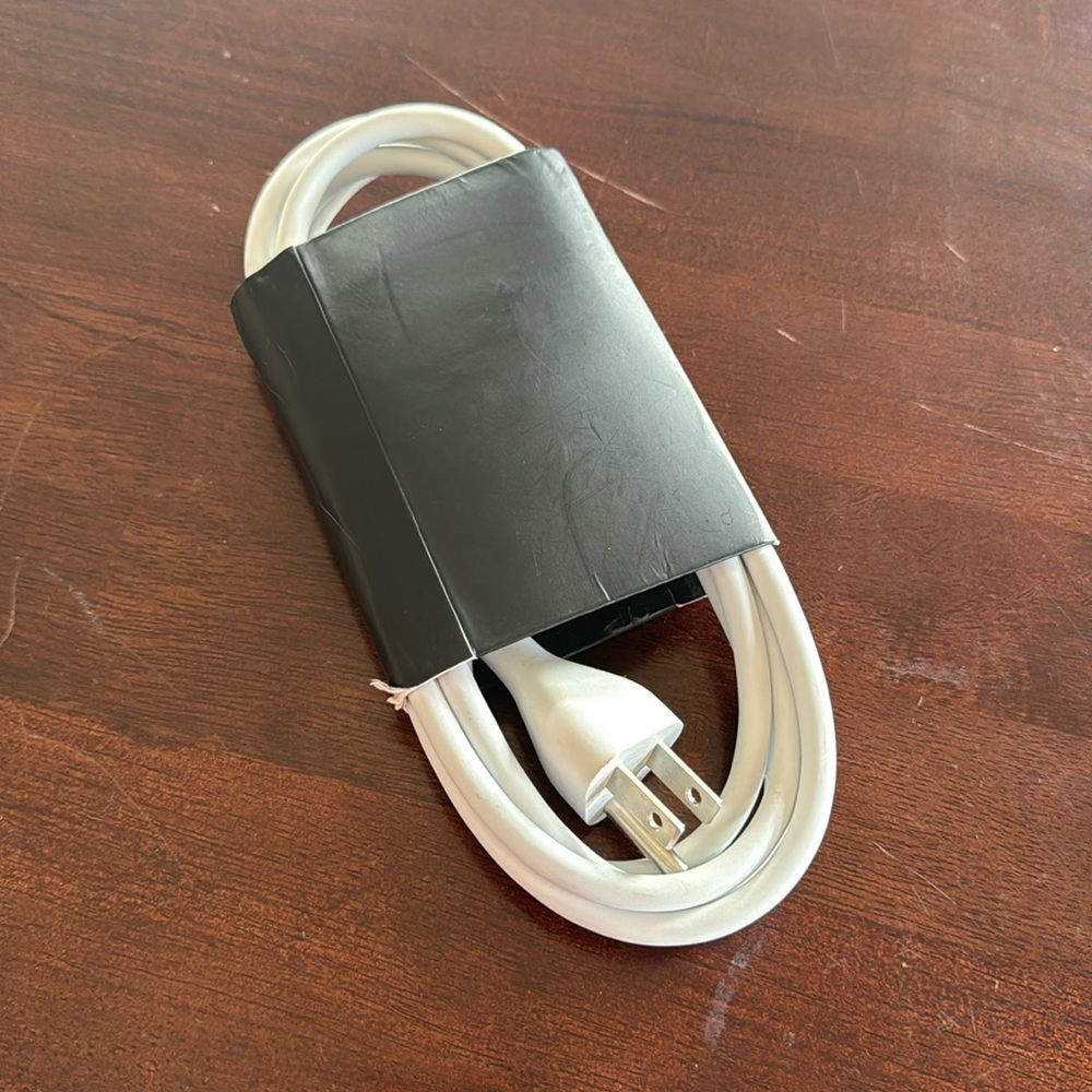 Brand new never used. MacBook charger extension